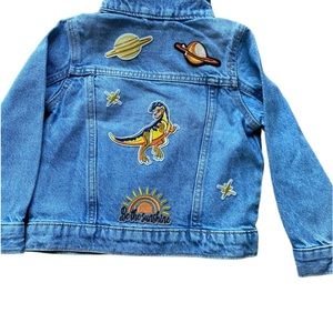 Light wash denim jacket with snap closure. New.